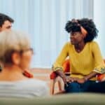 group therapy appointment, patients talking to each other, looking forward to a free ptsd assessment