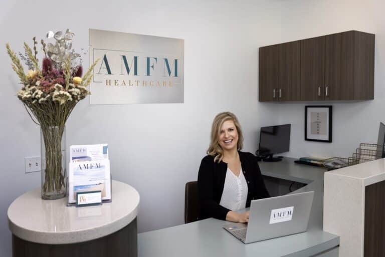 lady at front desk of AMFM mental health treatment center.