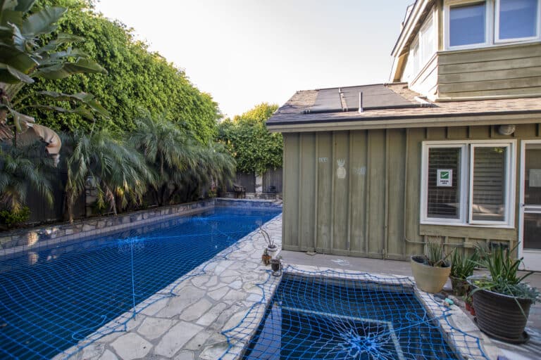 private backyard and pool for residents at amfm mental health treatment on street of the blue lantern, dana point