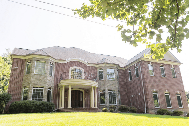 AMFM facility in Virginia featuring a stately brick building surrounded by greenery.