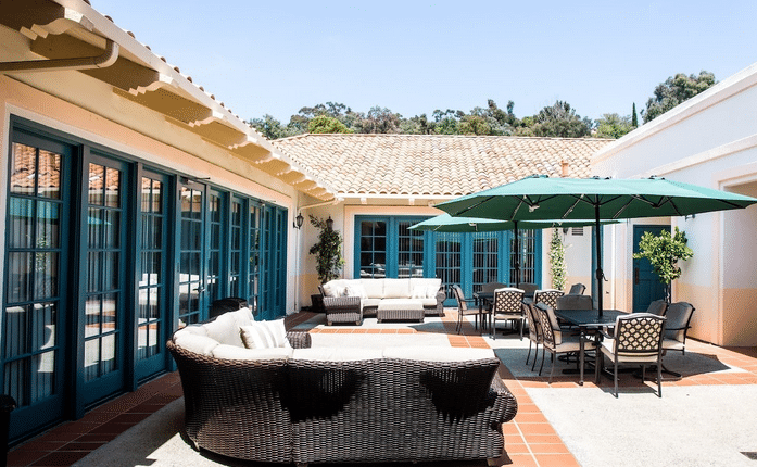 Outdoor seating area at an AMFM center.