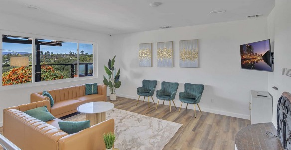 A modern therapy space with comfortable seating.