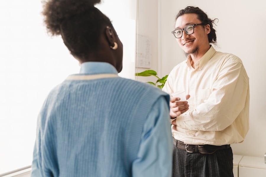 Man and a woman together talking about how to challenge anxious thoughts