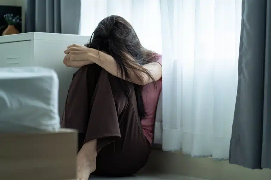 Person wondering if depression is due to a chemical brain imbalance