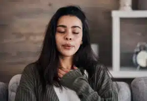 woman practicing breathing for the ABCs of trauma