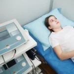 Woman receiving Transcranial Magnetic Stimulation therapy or tms treatment