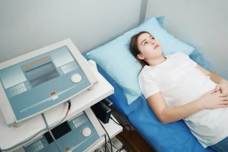 Woman receiving Transcranial Magnetic Stimulation therapy or tms treatment