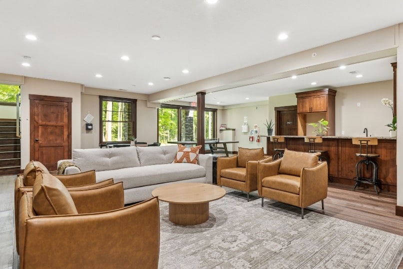A peaceful therapy room at an AMFM facility with comfortable seating and calming natural light, representing a safe space for healing.
