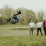 Man doing a backflip showing off in front of his friends due to histrionic personality disorder in adults