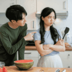 Man who has dependent personality disorder in adults poking his girlfriend while she looks upset