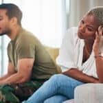 couple on therapist couch, experiencing anger in relationships