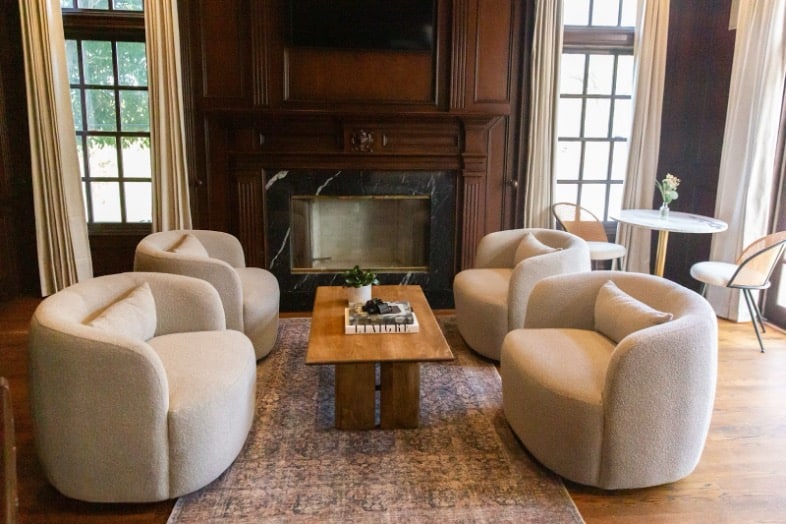 AMFM therapy room with comfortable white couches.