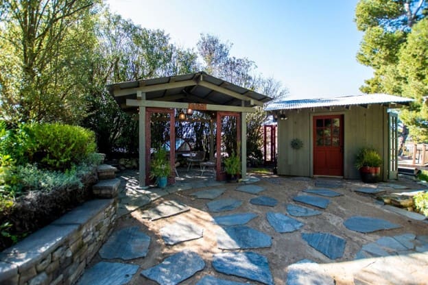 Backyard with shed and gazebo | AMFM Treatment
