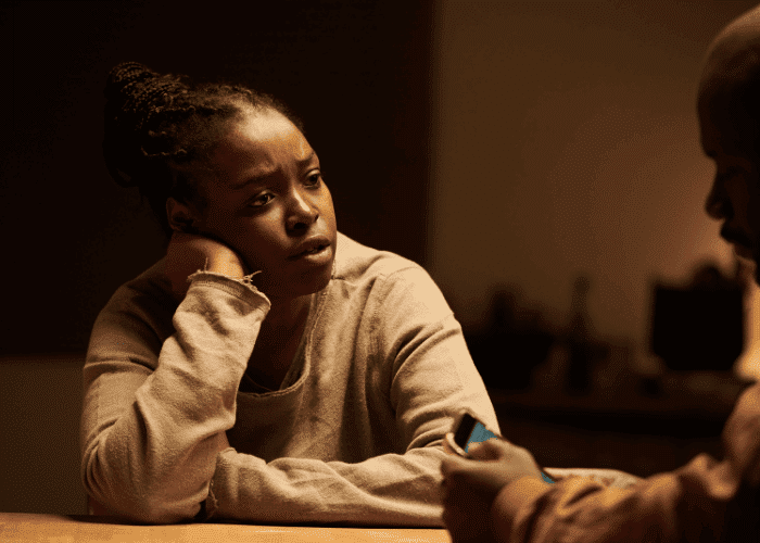 Woman looking frustrated, struggling with mood swings, asking are mood disorders genetic?