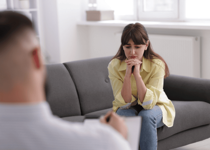 Woman in a therapy session wondering how minnesota is updating access to care in 2025-2026