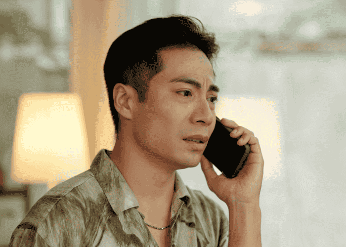 Man on the phone looking upset, getting crisis support as part of California's mental health laws