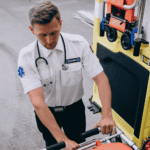 Paramedic attending to someone needing crisis support in line with Virginia behavioral health services law