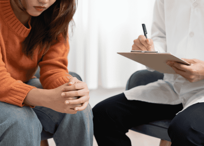 Woman in therapy session after changes to Washington's Involuntary Treatment Act