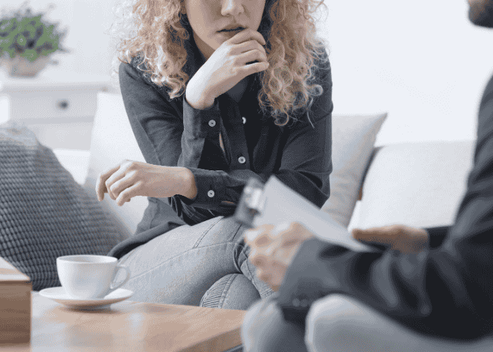 Person in therapy after the mental health policies in Washington state