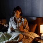 Woman taking medication as part of her mental health treatment plan