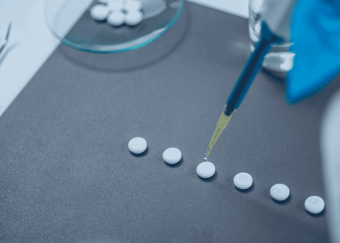 Testing medication representing mental health advances 2026