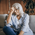 Woman looking unhappy due to depression in midlife