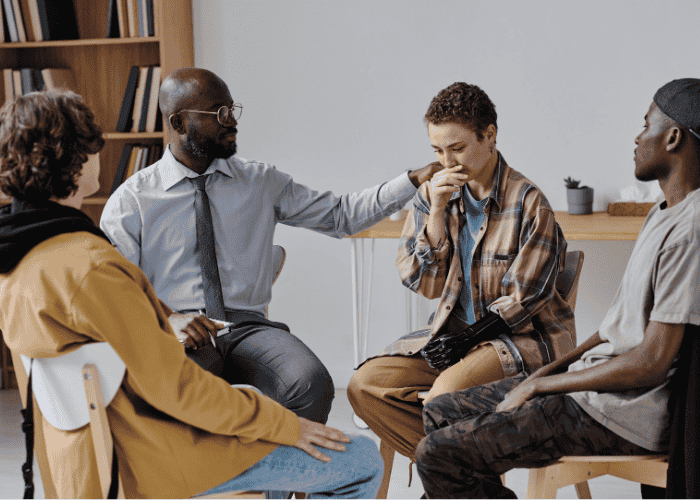 group therapy session after adults delay mental health treatment