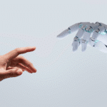 Human hand meeting robot hand representing AI and mental health