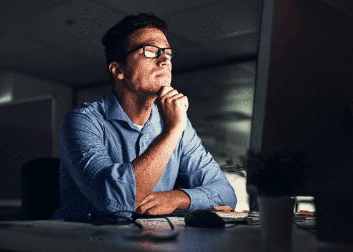 Man focusing on his laptop after learning the ways to achieve flow state