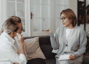 Woman talking to a therapist during a Mental Health Intervention Service