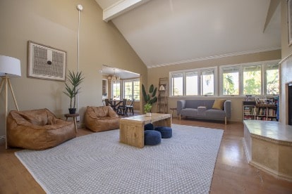 Calm, home-like common area inside an AMFM Mental Health Treatment facility serving adults with anxiety disorders.
