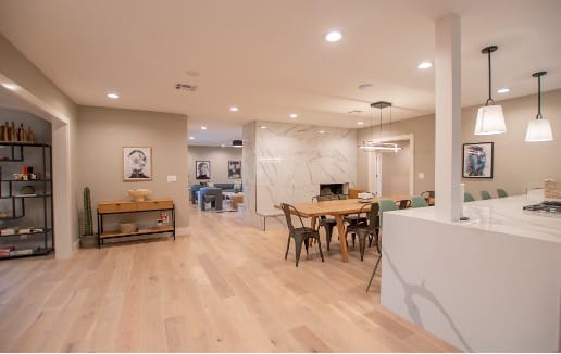 AMFM Mental Health Treatment residential facility with comfortable lounge seating and natural lighting, providing a calm, home-like environment for trauma-informed acute stress disorder care.